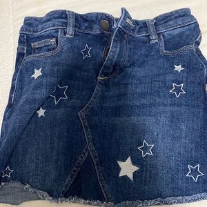 DL1961 kids denim skirt with embroidered stars on it
